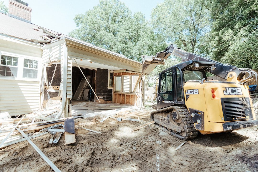 engagement-photography-03 a-bulldozer-is-parked-in-front-of-a-house-u8ushg1pqny